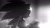 Size: 1191x670 | Tagged: safe, artist:einnharder, sonic the hedgehog, hedgehog, abstract background, alternate universe, au:fall into the void, glowing eyes, greyscale, looking down, looking offscreen, male, monochrome, pink eyes, sitting, smile, solo, sonic riders, spot color, sunglasses