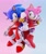 Size: 1728x2048 | Tagged: safe, artist:ladylunanova, amy rose, sonic the hedgehog, 2022, 3d, amy x sonic, clothes, duo, duo female, female, females only, gradient background, half r63 shipping, lesbian, linking arms, looking at each other, lovely couple, mid-air, redraw, shipping, smile, sonic advance 3, trans female, transgender