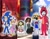 Size: 1280x989 | Tagged: safe, artist:lubamatusevich, sonic the hedgehog, non-sonic oc, oc, oc:arina (fundamental paper education), oc:artem doorman (murder drones), oc:artemiy morningstar (hazbin hotel), oc:ksusha morningstar (hazbin hotel), oc:marie (the amazing digital circus), oc:pelageya (the amazing digital circus), brawl stars, brother and sister, carl (brawl stars), cartoon network, cat ears, child, clothes, cosplay, crossover, demon, dress, drone (murder drones), flaky (htf), fundamental paper education, ginny weasley, glitch productions, halloween, halloween 2025, halloween outfit, happy tree friends, harry potter, hazbin hotel, helmet, horse, humanoid, madoka kaname, murder drones, oc only, open smile, puella magi madoka magica, robot, school uniform, sisters, smiling at viewer, sneakers, teenager, the amazing digital circus, tie, uniform, unikitty, worker drone