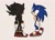 Size: 1136x829 | Tagged: safe, artist:rodka_sth, shadow the hedgehog, sonic the hedgehog, duo, head tilt, looking at each other, looking at them, simple background, smile, standing