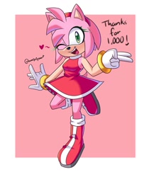 Size: 1000x1150 | Tagged: safe, artist:amipiyoart, amy rose, 2022, amybetes, border, cute, english text, heart, looking at viewer, mouth open, pink background, signature, simple background, smile, solo, standing on one leg, wink