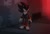 Size: 694x473 | Tagged: safe, artist:starhuddi, shadow the hedgehog, hedgehog, 2022, frown, gun, holding something, looking at each other, male, solo, standing