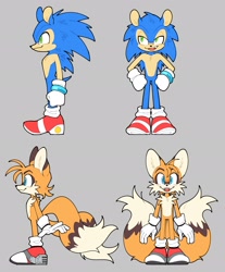 Size: 1692x2048 | Tagged: safe, artist:8xenon8, artist:shadails, miles "tails" prower, sonic the hedgehog, 2021, crystal ring, duo, flat colors, front view, fur markings, grey background, jet anklet, light shoes, looking at viewer, looking offscreen, mouth open, open smile, redesign, redraw, side view, simple background, smile, smiling at viewer, standing
