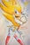 Size: 1385x2048 | Tagged: safe, artist:seaminglygood, sonic the hedgehog, super sonic, hedgehog, 2026, arms folded, flying, looking at viewer, male, mid-air, no mouth, pointing, signature, solo, sparkles, super form, traditional media