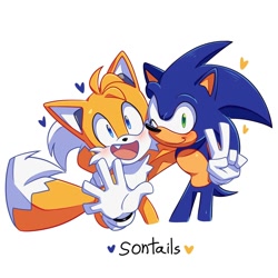 Size: 2000x2000 | Tagged: safe, artist:la_gata_golosa_, miles "tails" prower, sonic the hedgehog, anonymous editor, arm around shoulders, blushing, duo, edit, gay, heart, heart tail, looking at viewer, mouth open, one fang, ship name, shipping, simple background, smile, sonic x tails, standing, text, v sign, waving, white background